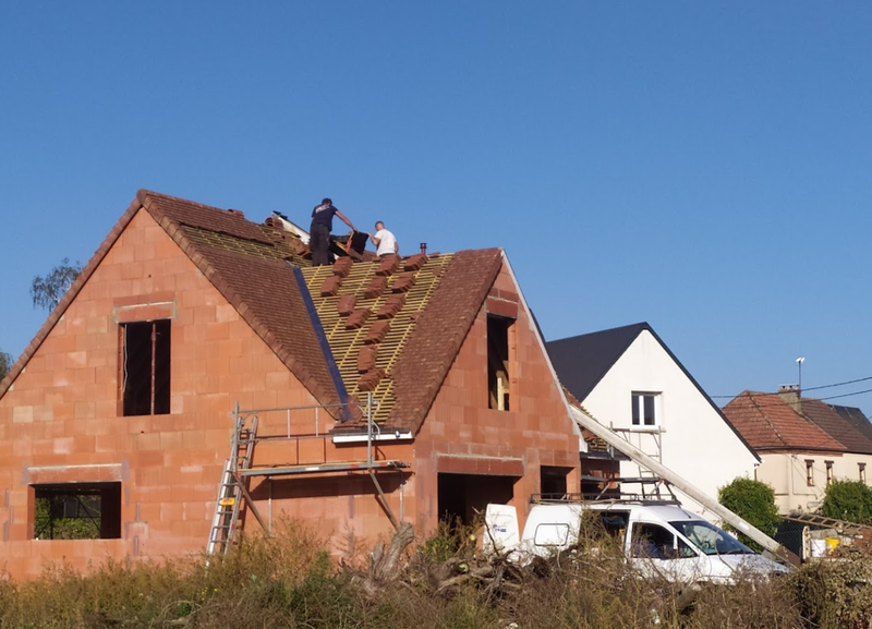 Pascal sur un chantier de couverture